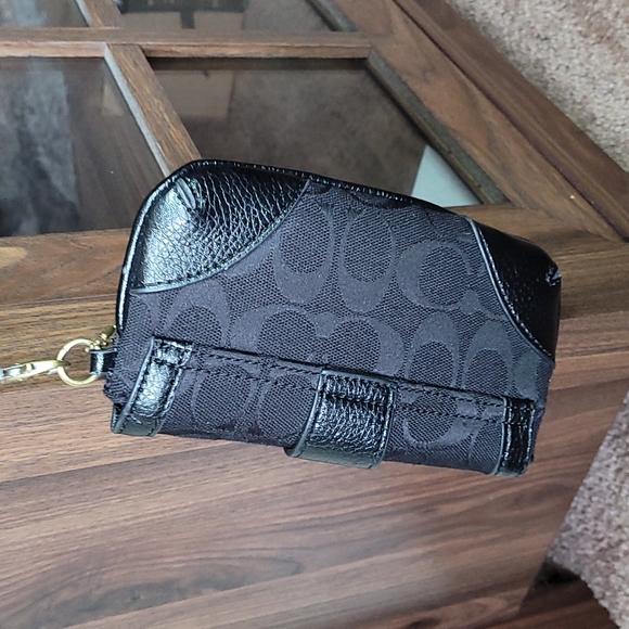 - Coach wristlet black super cute large enough for phone. - Picture 7 of 16